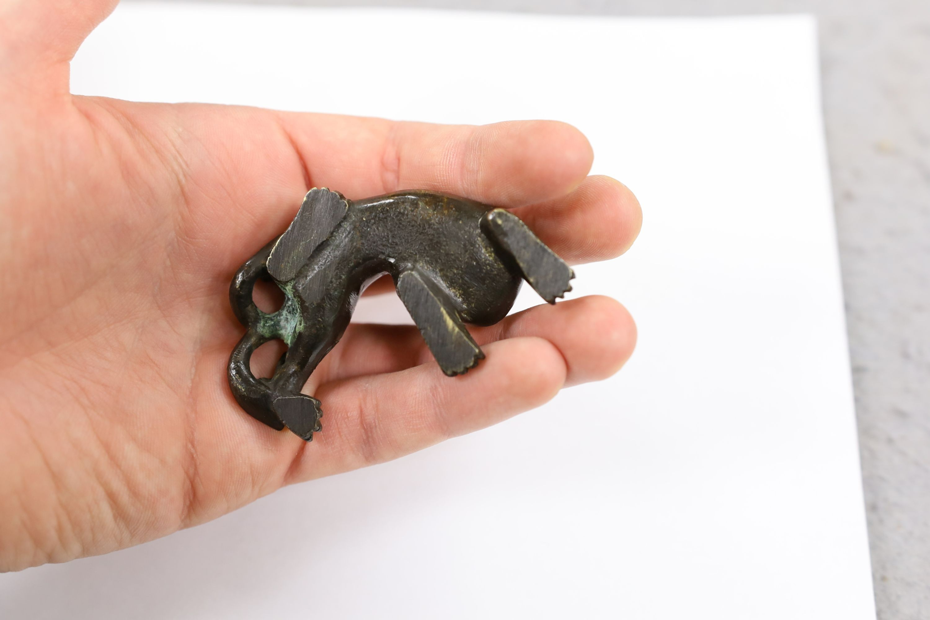 Five Chinese or Tibetan bronze figures or Buddhist implements, tallest 13cms high